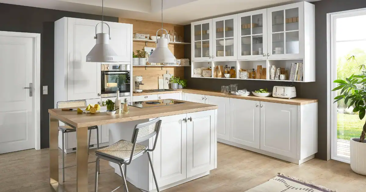 Bright modern kitchen with a white wood kitchen island and matching wood countertops