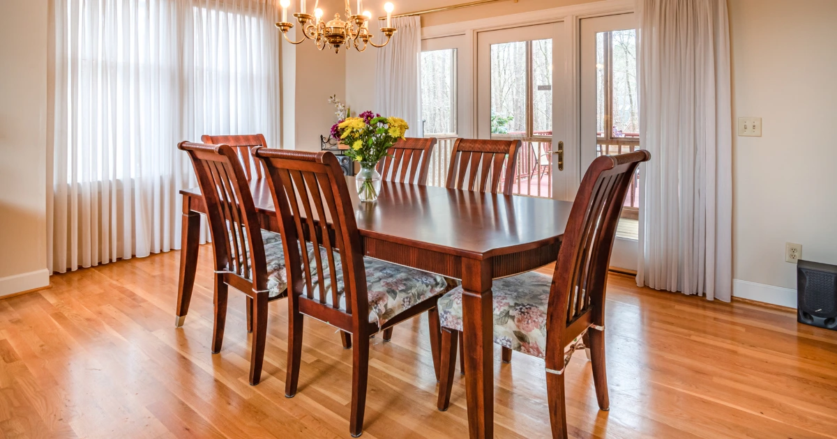 Traditional dining room design featuring solid wood custom dining tables